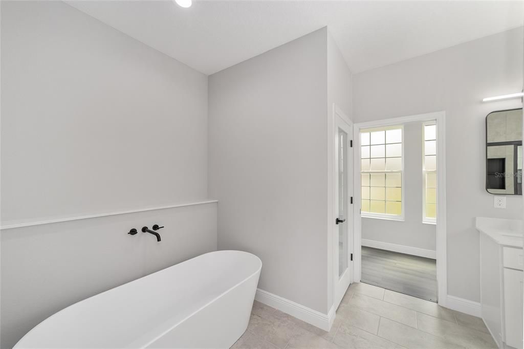 Bathroom, Free Standing Baths, Interior, Recessed Lighting, Wood Texture Flooring