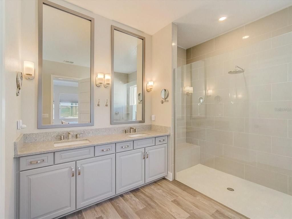 Bathroom, Dual Sink Vanities, Glass Shower, Interior, Recessed Lighting, Wood Texture Flooring
