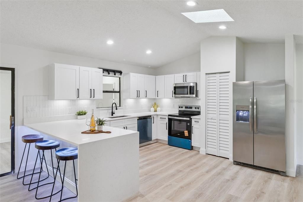 Interior, Kitchen, Recessed Lighting, Stainless Steel Appliances, Wood Texture Flooring