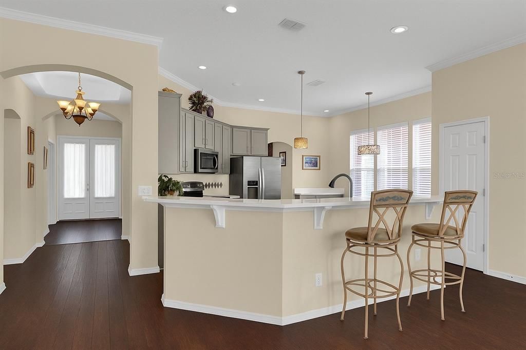 Chandelier, Interior, Kitchen, Pendant Lights, Recessed Lighting, Stainless Steel Appliances, Wood Texture Flooring