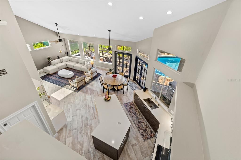 Dining room, Fireplace, Interior, Living room, Pendant Lights, Recessed Lighting, Wood Texture Flooring