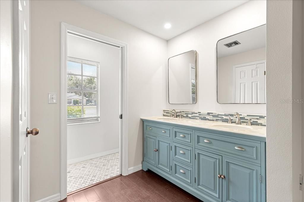 Bathroom, Dual Sink Vanities, Interior, Recessed Lighting, Wood Texture Flooring