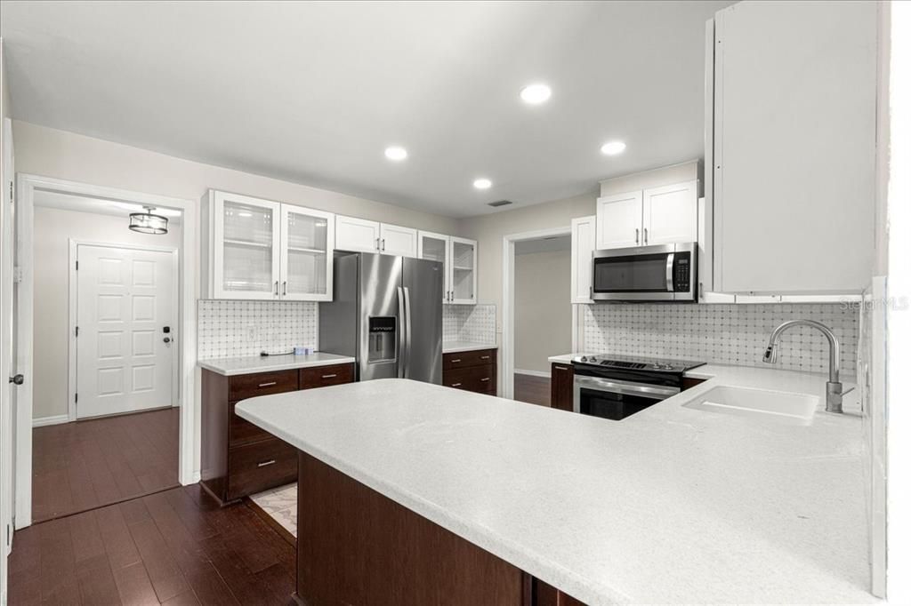 Interior, Kitchen, Recessed Lighting, Stainless Steel Appliances, Wood Texture Flooring