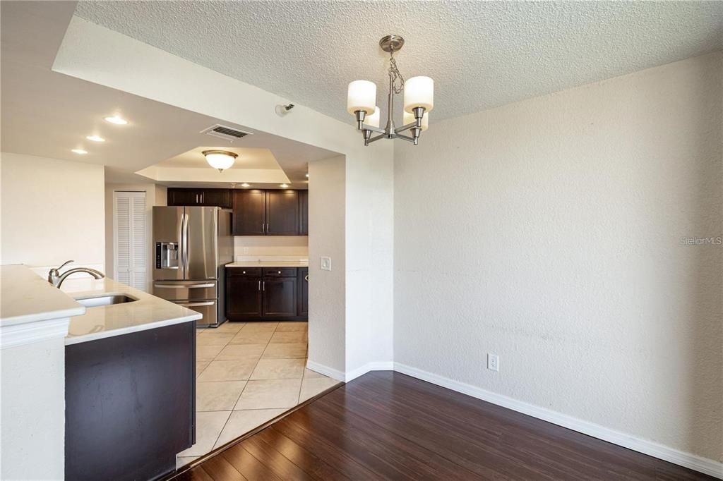 Chandelier, Interior, Kitchen, Recessed Lighting, Stainless Steel Appliances, Wood Texture Flooring