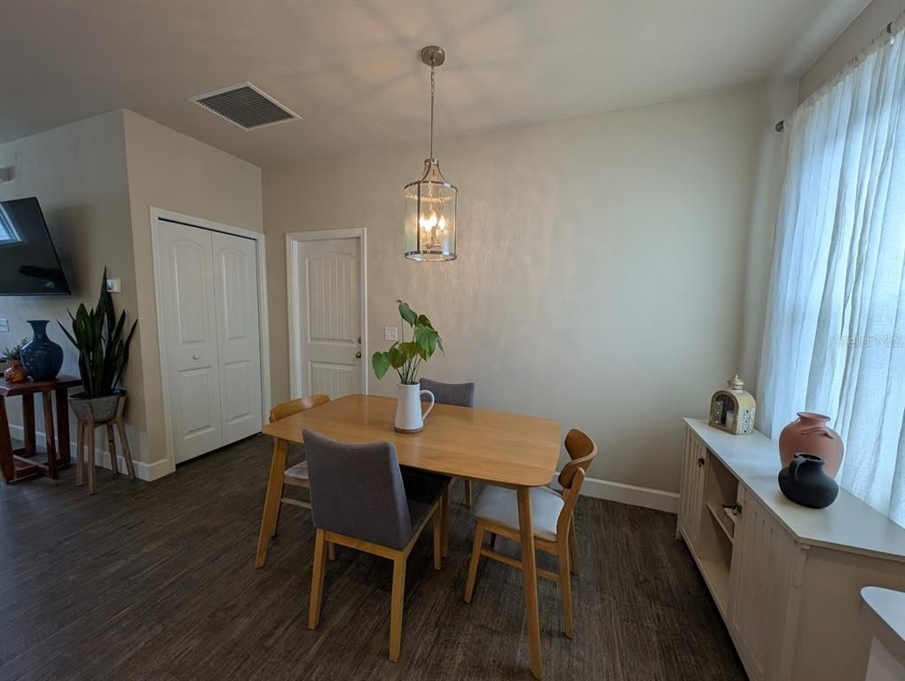 Dining room, Interior, Pendant Lights, Wood Texture Flooring