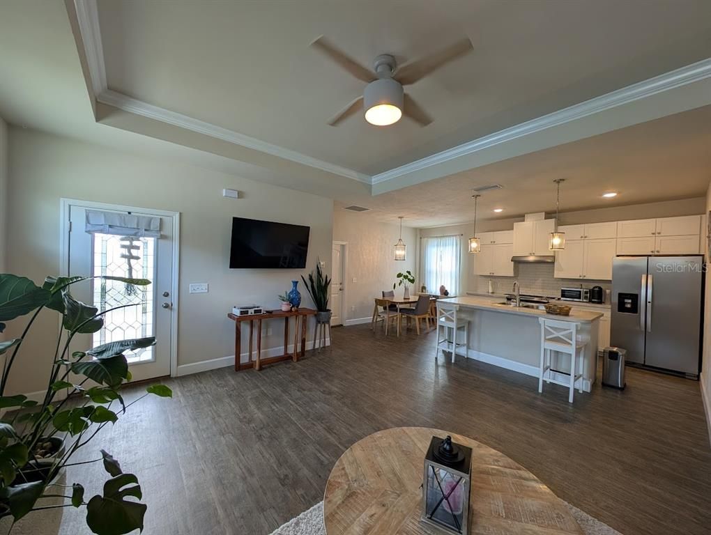 Dining room, Interior, Kitchen, Pendant Lights, Recessed Lighting, Stainless Steel Appliances, Wood Texture Flooring