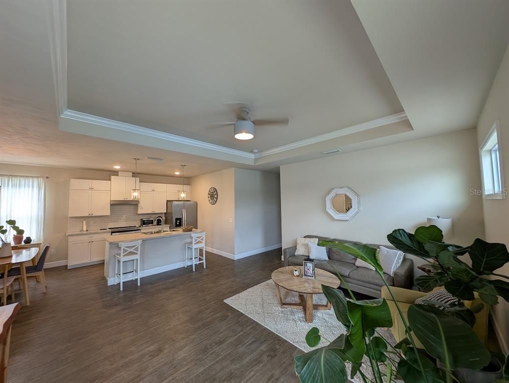 Dining room, Interior, Kitchen, Pendant Lights, Recessed Lighting, Stainless Steel Appliances, Wood Texture Flooring