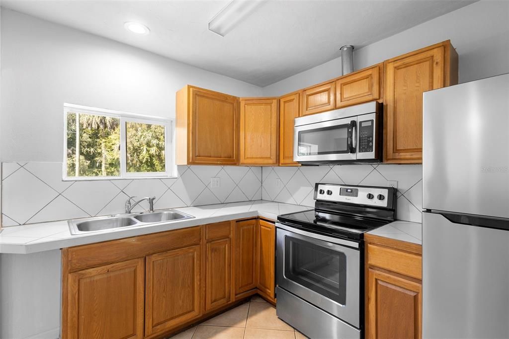 Interior, Kitchen, Recessed Lighting, Tile Countertops