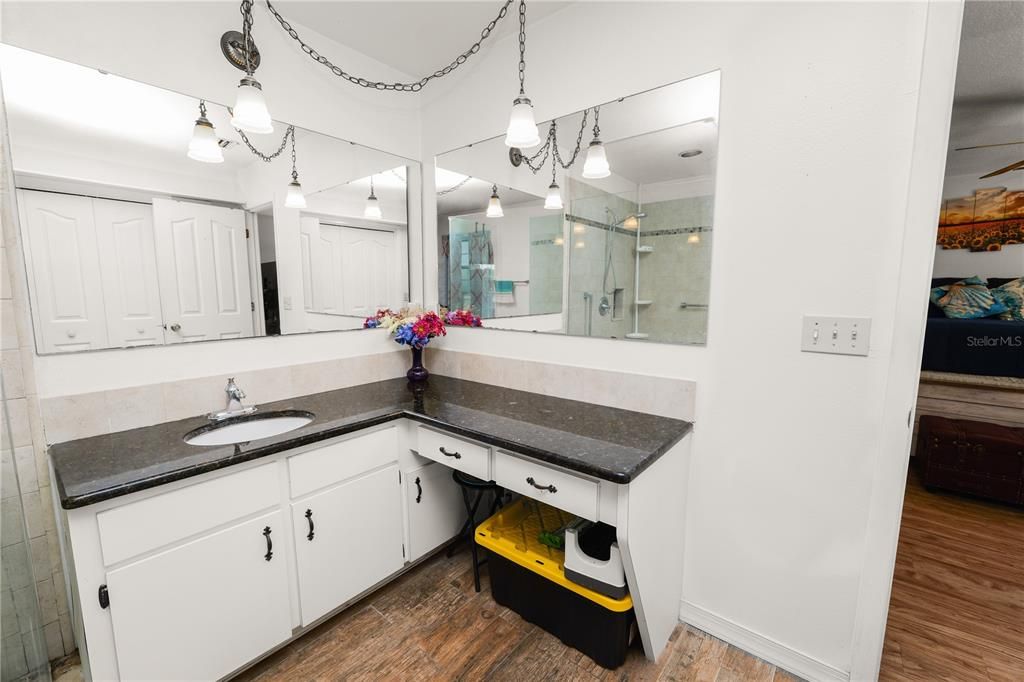 Bathroom, Dual Sink Vanities, Glass Shower, Interior, Pendant Lights, Wood Texture Flooring