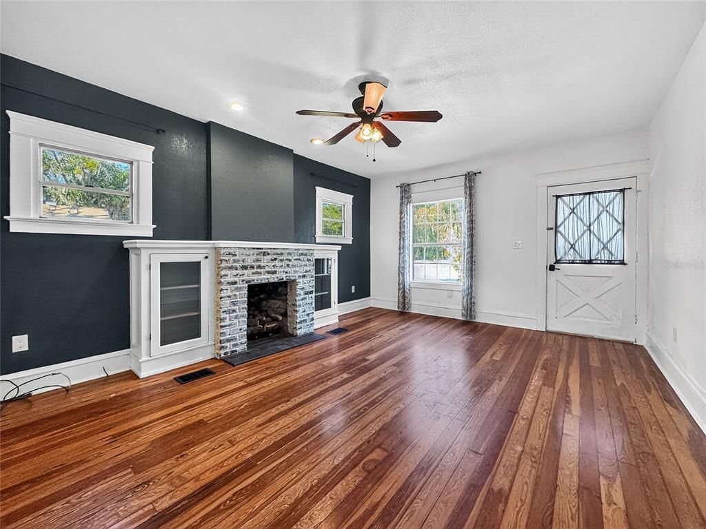 Empty room, Fireplace, Interior, Recessed Lighting, Wood Texture Flooring