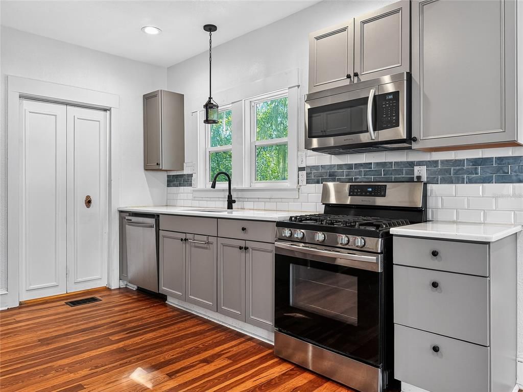 Interior, Kitchen, Pendant Lights, Recessed Lighting, Stainless Steel Appliances, Wood Texture Flooring