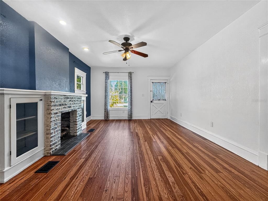 Empty room, Fireplace, Interior, Recessed Lighting, Wood Texture Flooring