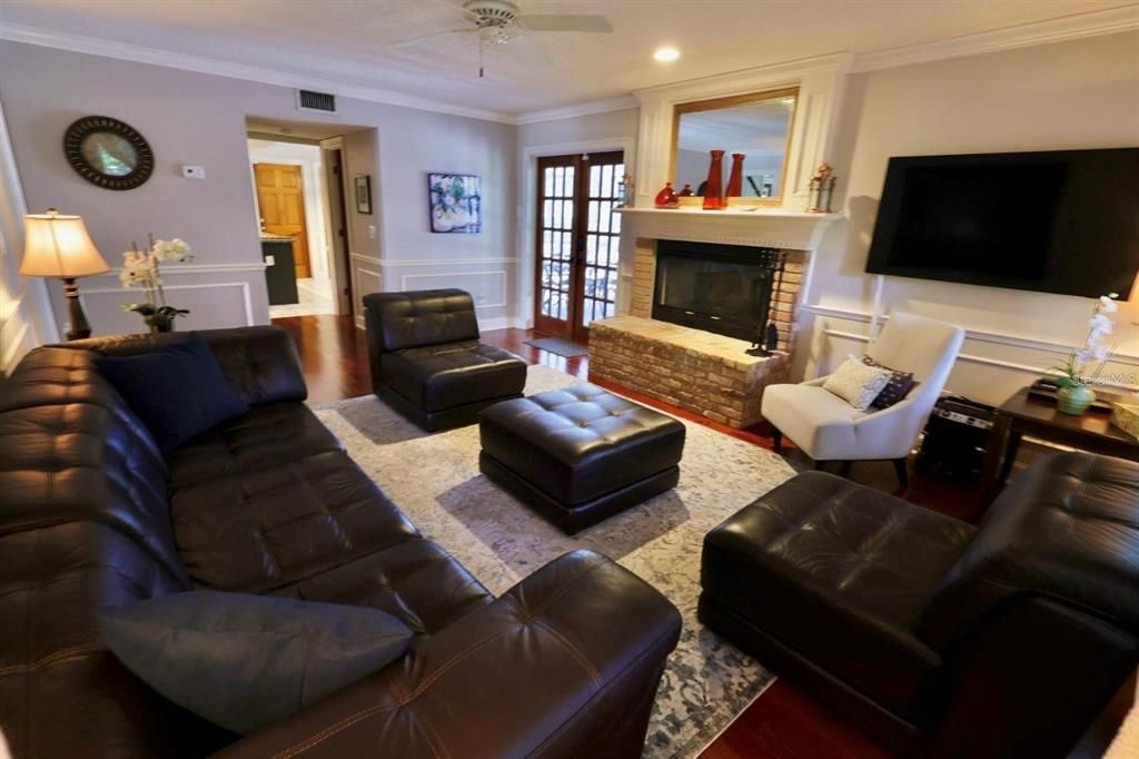 Fireplace, Interior, Living room, Recessed Lighting, Wood Texture Flooring