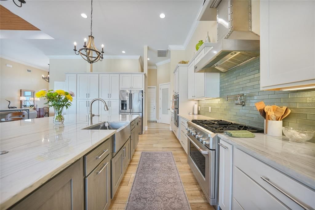 Chandelier, Interior, Kitchen, Pendant Lights, Recessed Lighting, Stainless Steel Appliances, Wood Texture Flooring