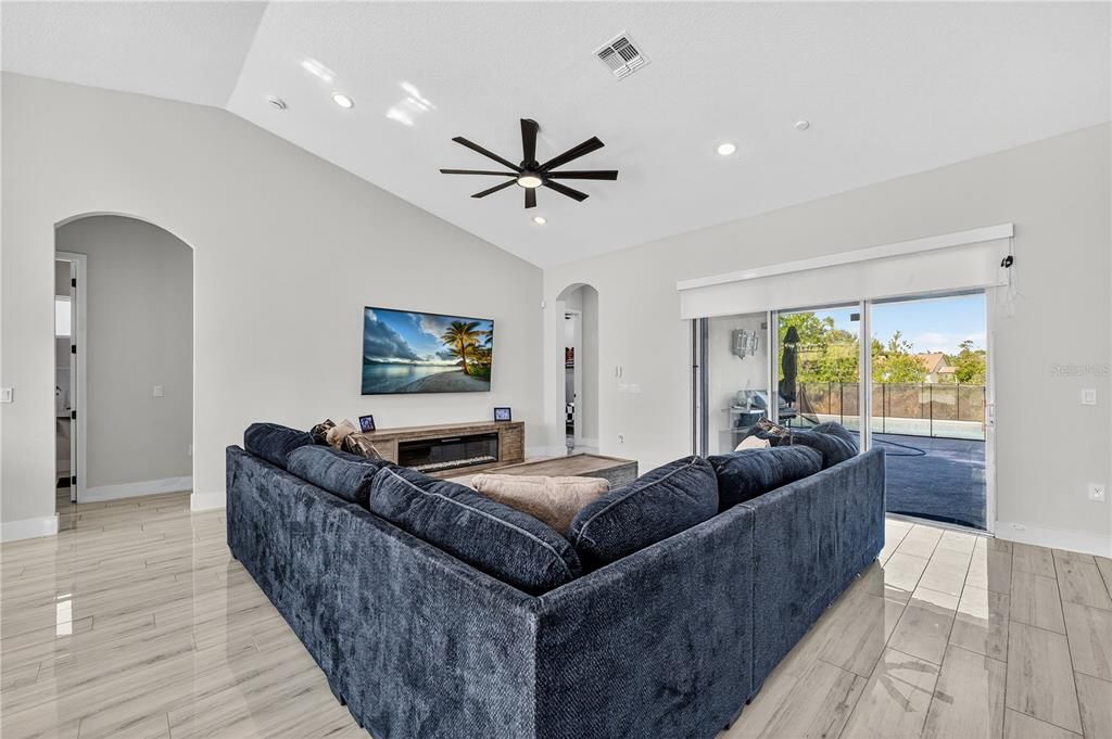 Fireplace, Interior, Living room, Recessed Lighting, Wood Texture Flooring