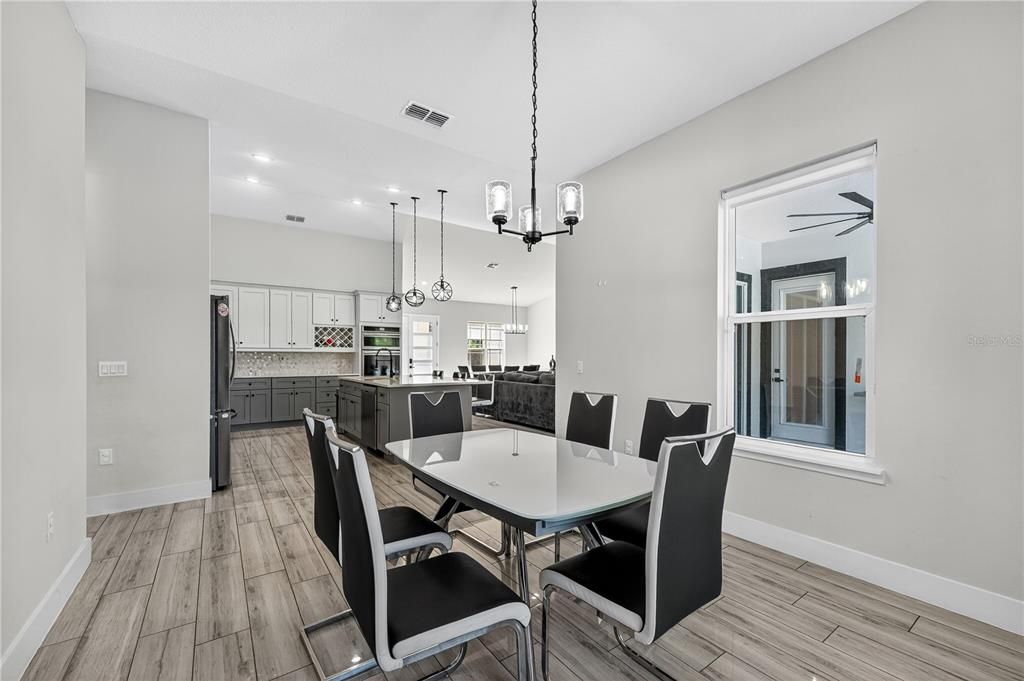 Chandelier, Dining room, Interior, Kitchen, Pendant Lights, Recessed Lighting, Wood Texture Flooring