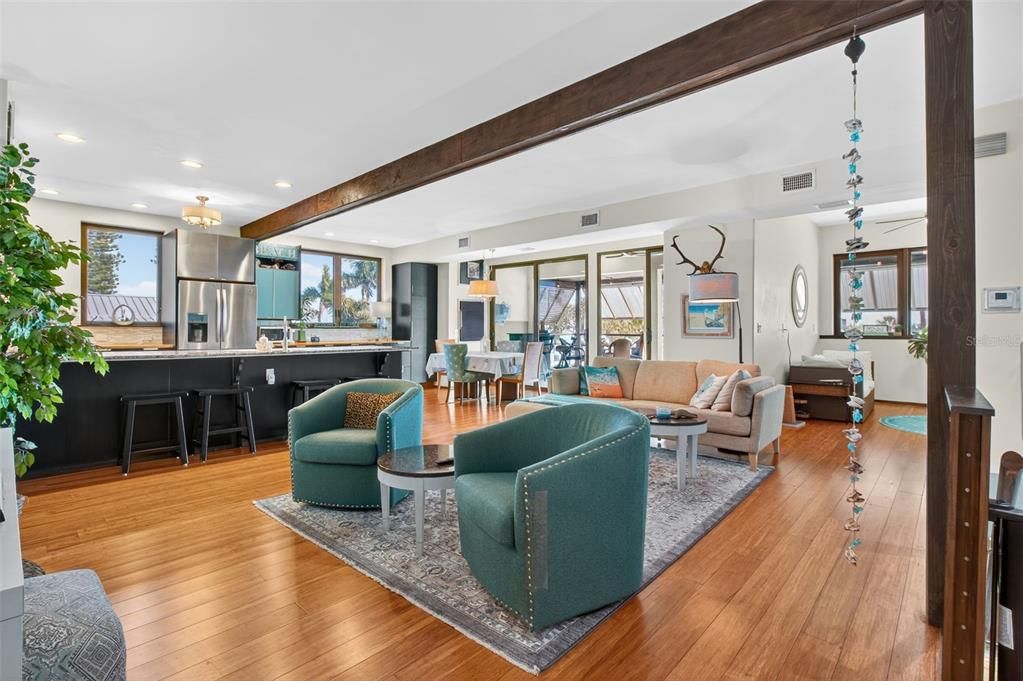 Dining room, Interior, Kitchen, Living room, Pendant Lights, Recessed Lighting, Stainless Steel Appliances, Wood Texture Flooring