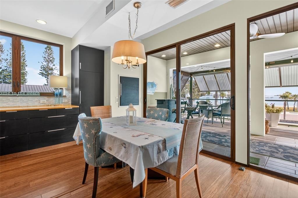 Chandelier, Dining room, Interior, Recessed Lighting, Water, Wood Texture Flooring