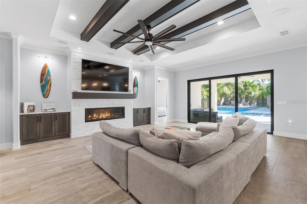 Fireplace, Interior, Living room, Recessed Lighting, Wood Texture Flooring