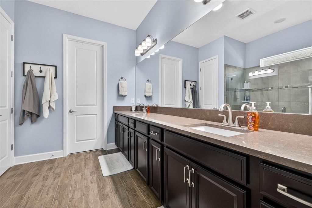 Bathroom, Dual Sink Vanities, Glass Shower, Interior, Wood Texture Flooring