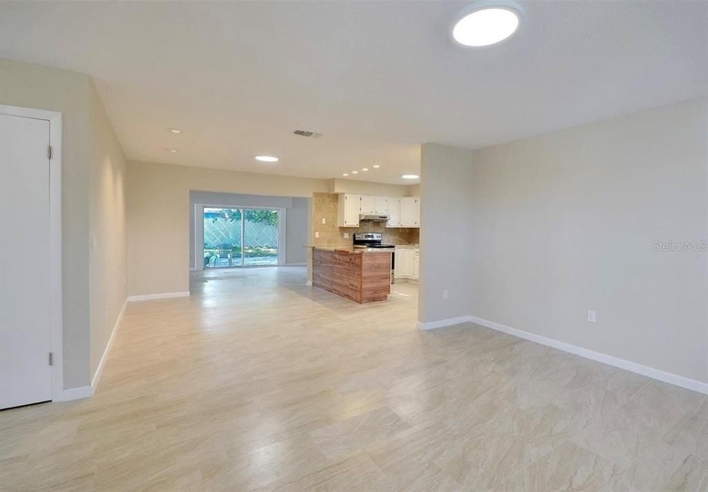 Empty room, Interior, Kitchen, Pendant Lights, Recessed Lighting, Wood Texture Flooring