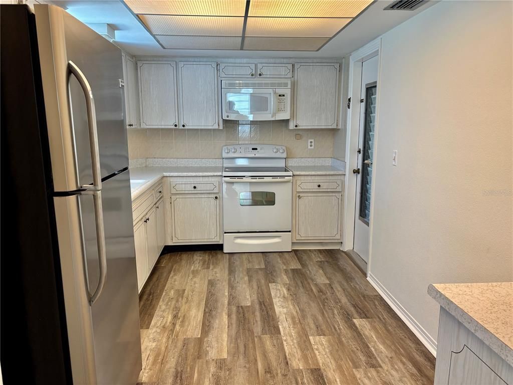 Interior, Kitchen, Stainless Steel Appliances, Wood Texture Flooring