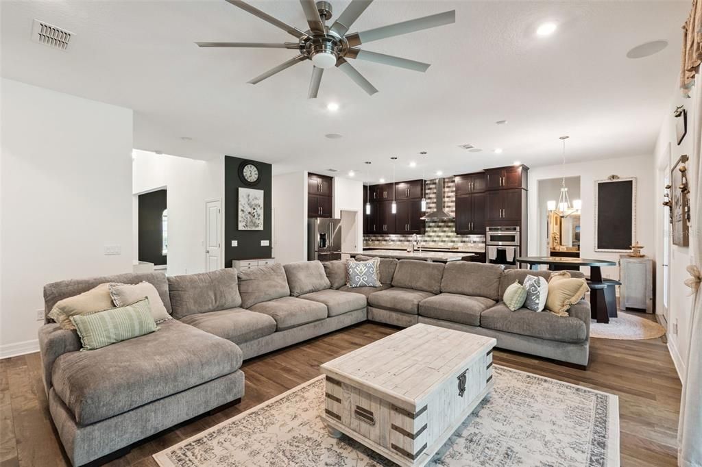 Dining room, Interior, Kitchen, Living room, Pendant Lights, Recessed Lighting, Stainless Steel Appliances, Wood Texture Flooring