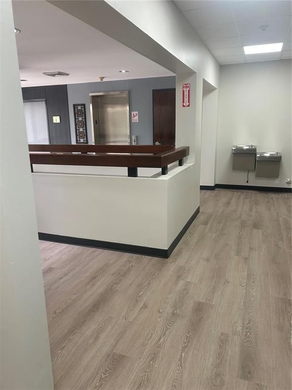 Elevator, Interior, Pendant Lights, Recessed Lighting, Wood Texture Flooring