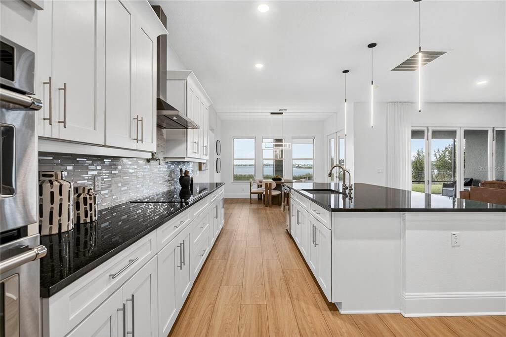 Interior, Kitchen, Pendant Lights, Recessed Lighting, Stainless Steel Appliances, Water, Wood Texture Flooring