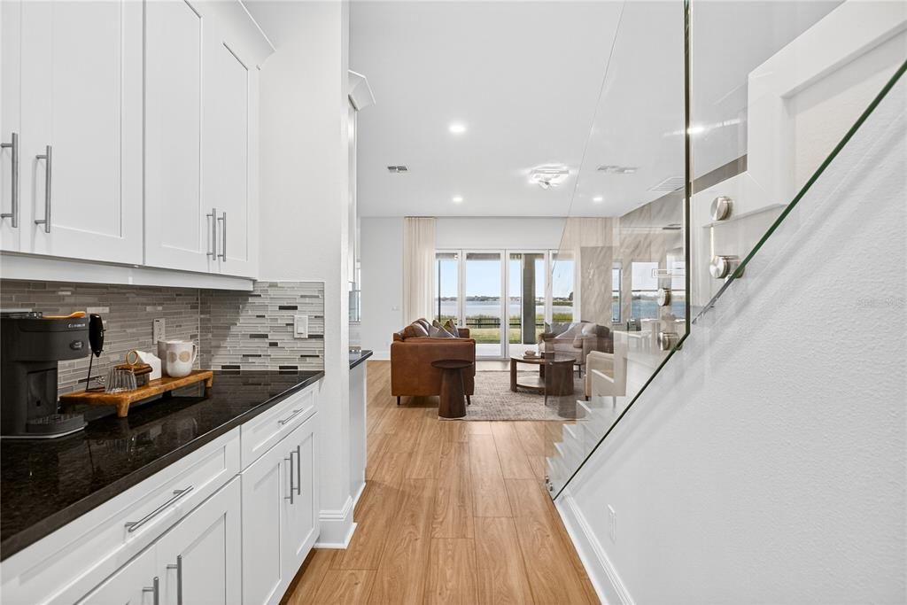 Dining room, Interior, Kitchen, Living room, Pendant Lights, Recessed Lighting, Water, Wood Texture Flooring
