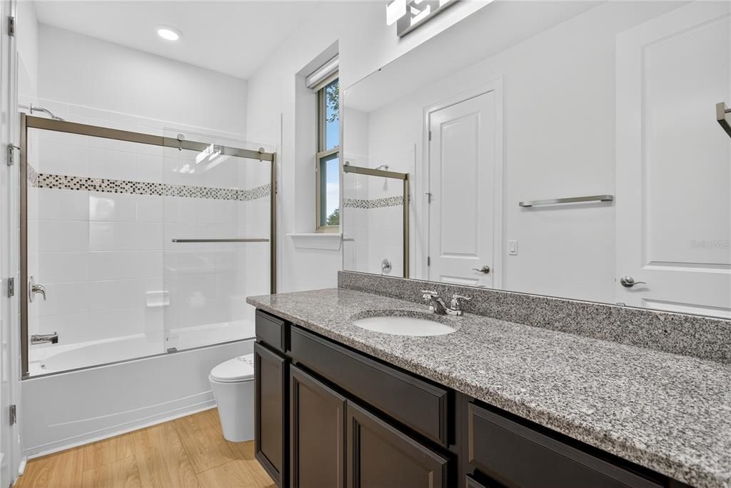 Bathroom, Glass Shower, Interior, Recessed Lighting, Wood Texture Flooring