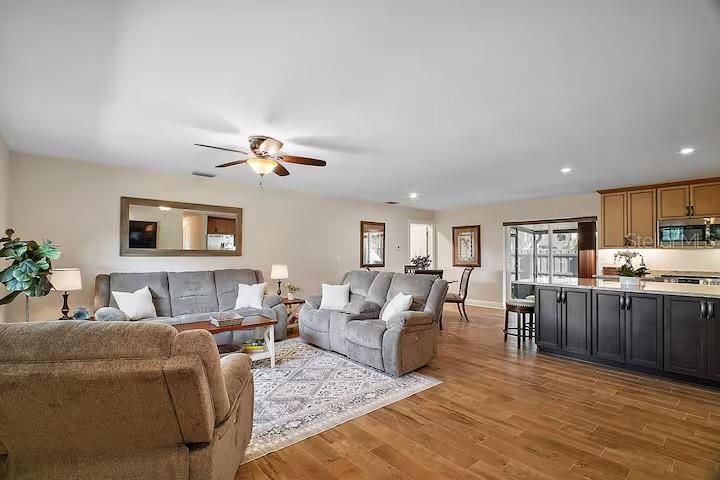 Dining room, Interior, Kitchen, Living room, Recessed Lighting, Stainless Steel Appliances, Wood Texture Flooring