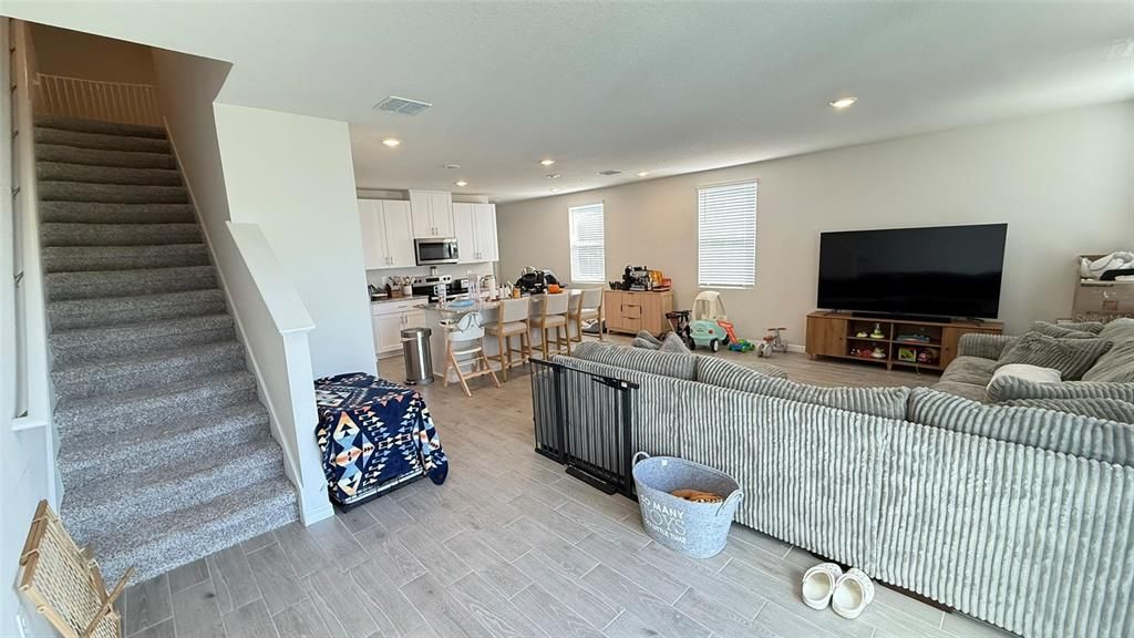 Dining room, Interior, Kitchen, Living room, Recessed Lighting, Stainless Steel Appliances, Wood Texture Flooring