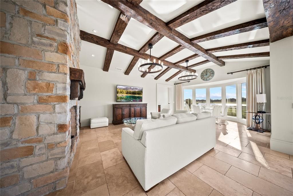 Interior, Living room, Pendant Lights, Recessed Lighting, Stone Walls, Water, Wooden Beams