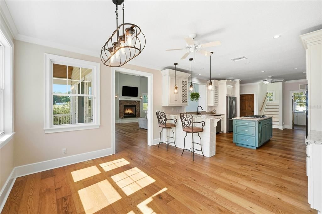 Fireplace, Interior, Kitchen, Pendant Lights, Recessed Lighting, Wood Texture Flooring