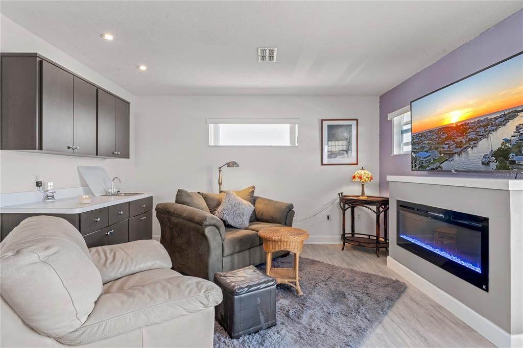 Fireplace, Interior, Living room, Recessed Lighting, Wood Texture Flooring