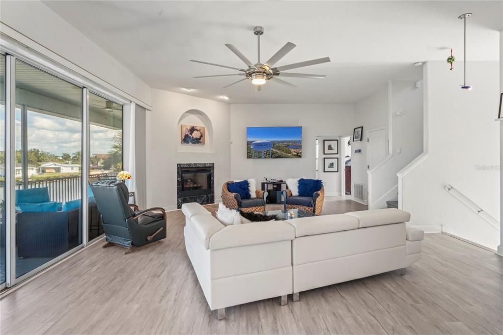 Fireplace, Interior, Living room, Recessed Lighting, Wood Texture Flooring