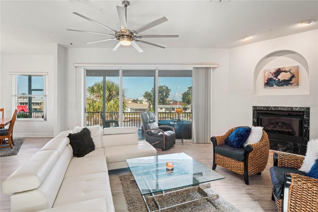 Fireplace, Interior, Living room, Recessed Lighting, Wood Texture Flooring