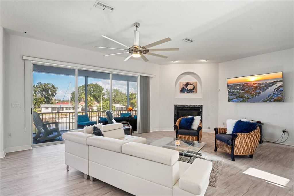 Fireplace, Interior, Living room, Recessed Lighting, Wood Texture Flooring