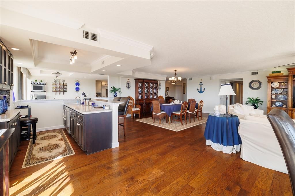 Chandelier, Dining room, Interior, Kitchen, Living room, Recessed Lighting, Wood Texture Flooring