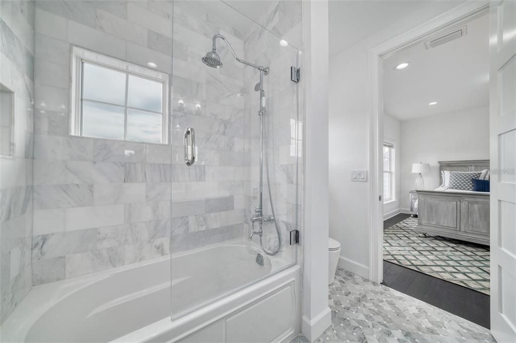 Bathroom, Bedroom, Glass Shower, Interior, Marble Walls, Recessed Lighting, Wood Texture Flooring