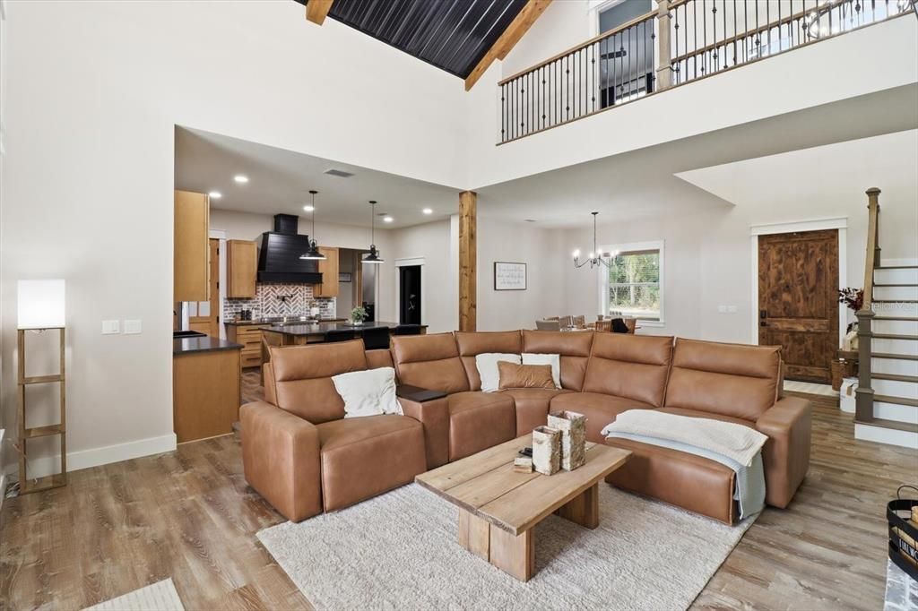 Chandelier, Dining room, Interior, Kitchen, Living room, Pendant Lights, Recessed Lighting, Wood Texture Flooring