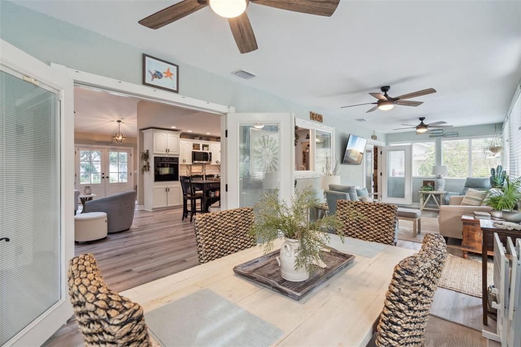 Dining room, Interior, Kitchen, Living room, Recessed Lighting, Stainless Steel Appliances, Wood Texture Flooring
