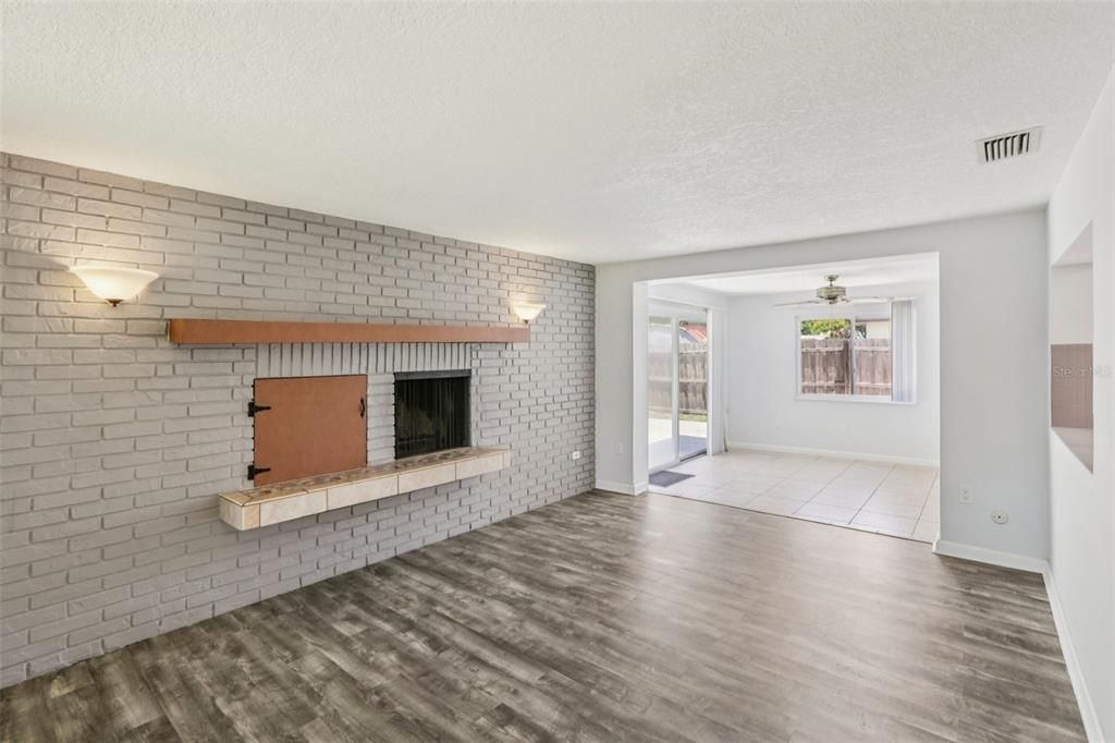 Empty room, Fireplace, Interior, Stone Walls, Wood Texture Flooring