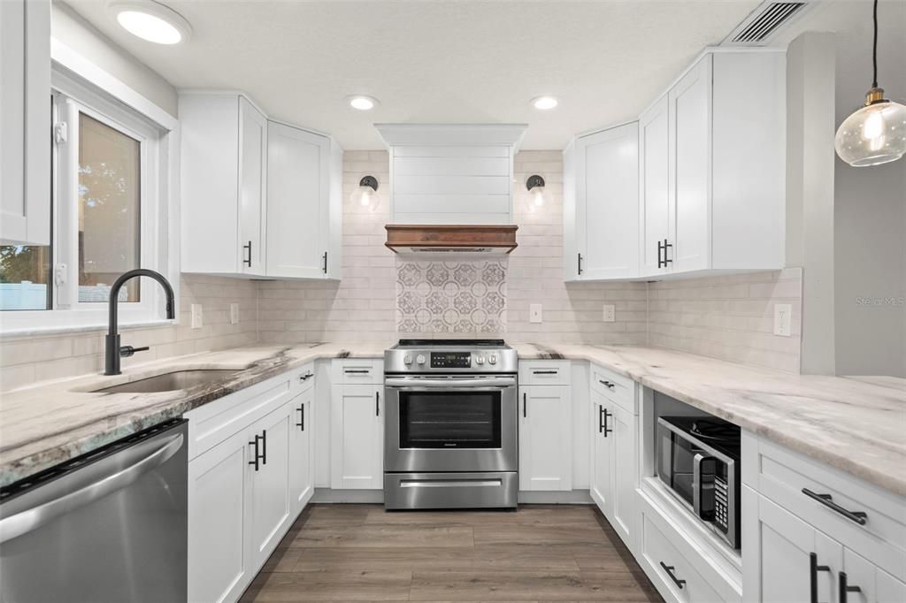 Interior, Kitchen, Pendant Lights, Recessed Lighting, Stainless Steel Appliances, Wood Texture Flooring