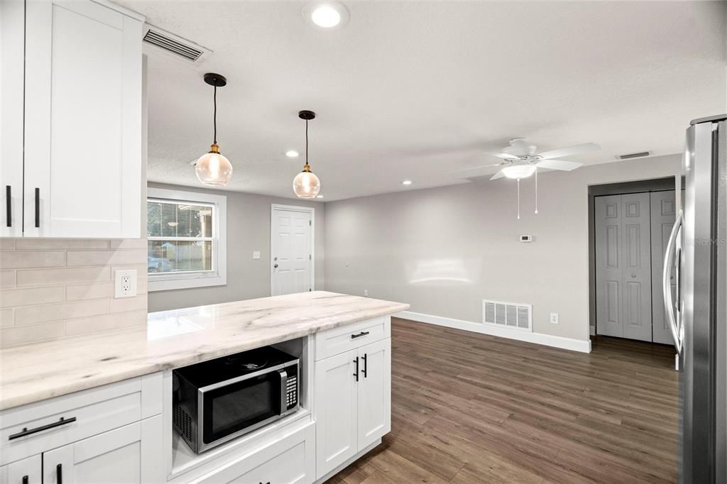 Interior, Kitchen, Pendant Lights, Recessed Lighting, Stainless Steel Appliances, Wood Texture Flooring