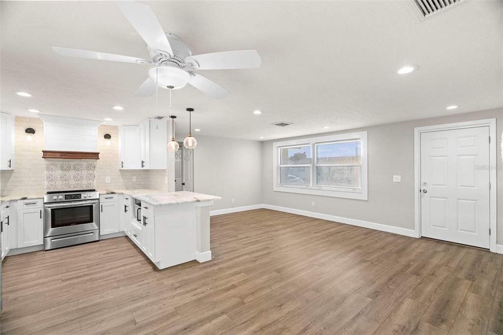 Interior, Kitchen, Pendant Lights, Recessed Lighting, Stainless Steel Appliances, Wood Texture Flooring