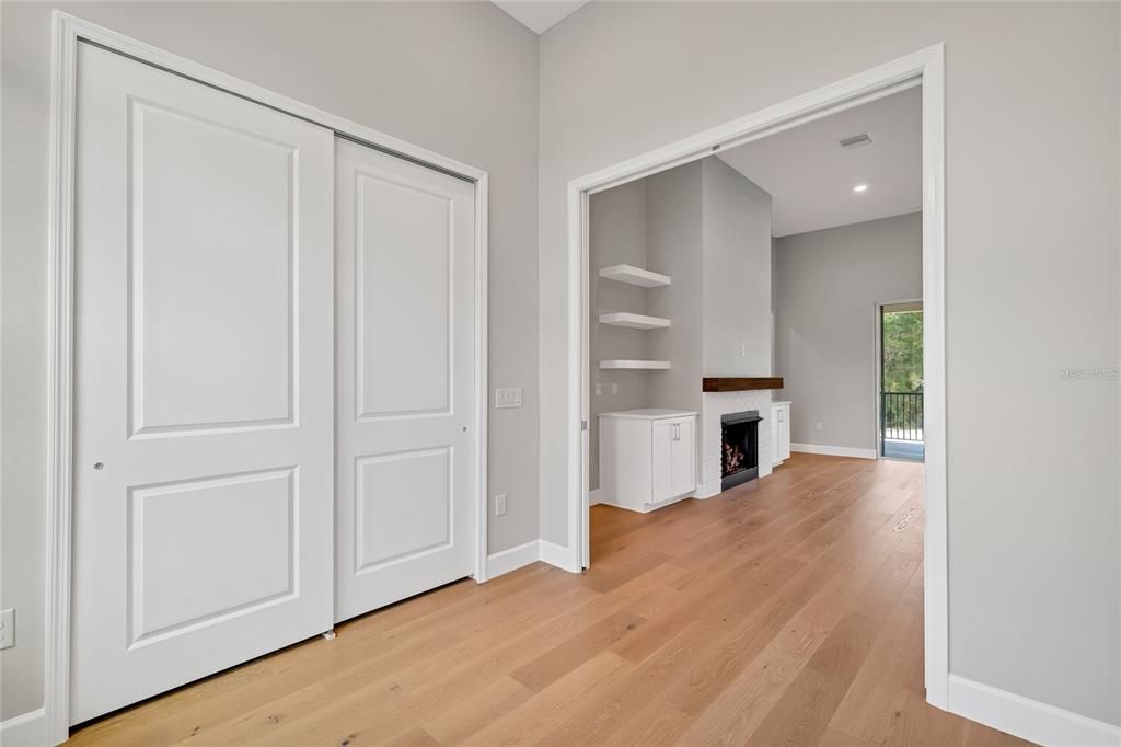 Empty room, Fireplace, Interior, Recessed Lighting, Wood Texture Flooring