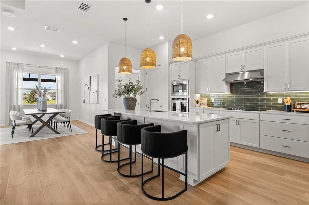 Dining room, Interior, Kitchen, Pendant Lights, Recessed Lighting, Stainless Steel Appliances, Wood Texture Flooring