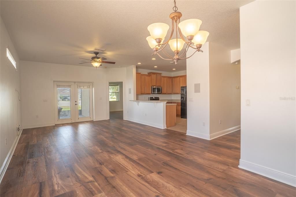 Chandelier, Empty room, Interior, Kitchen, Stainless Steel Appliances, Wood Texture Flooring